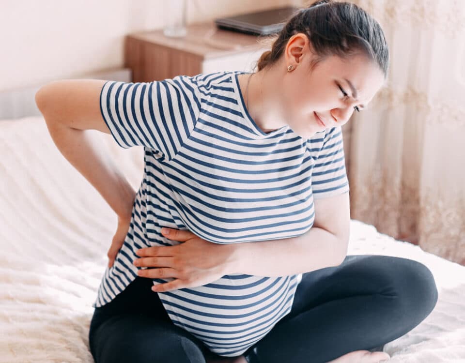 Lady with back and rib pain during pregnancy
